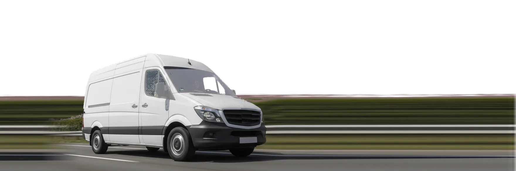A white service van driving on a highway