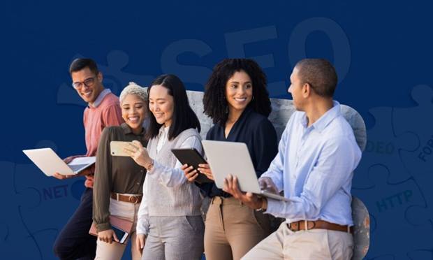 Blog banner: a group of marketers gathered around a laptop and a tablet.